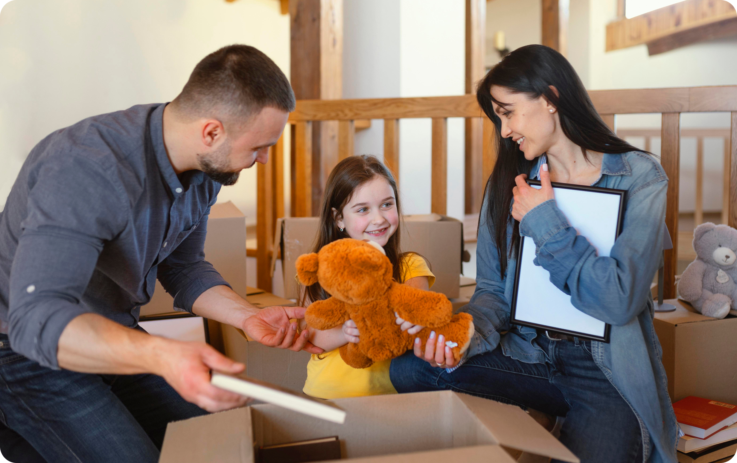 Family unpacking boxes